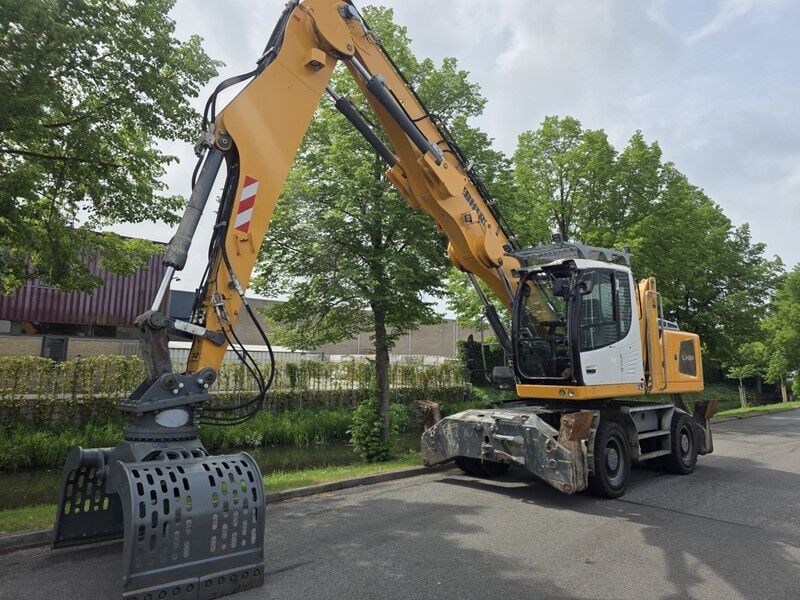 2015 Liebherr LH 24 material handler, front three-quarter view