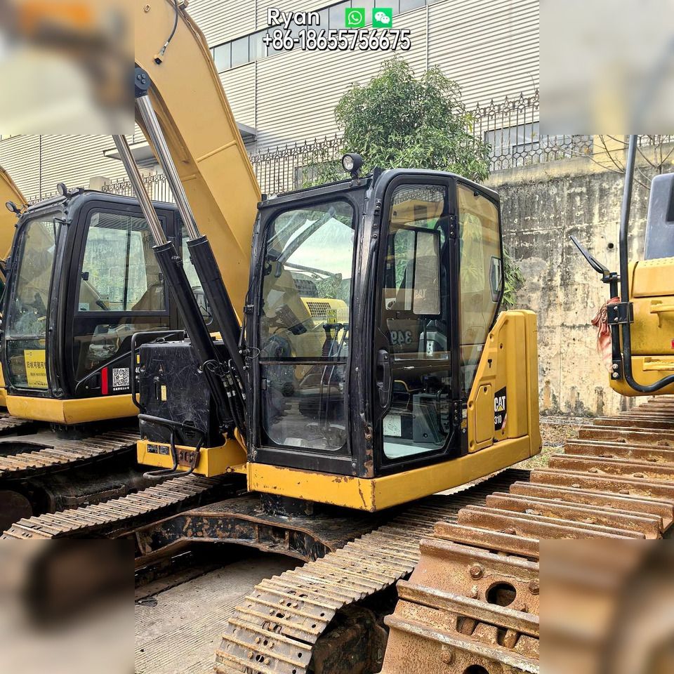 2019 Caterpillar 310 crawler excavator, side view of cab 2019 Caterpillar 310 crawler excavator, side view of cab