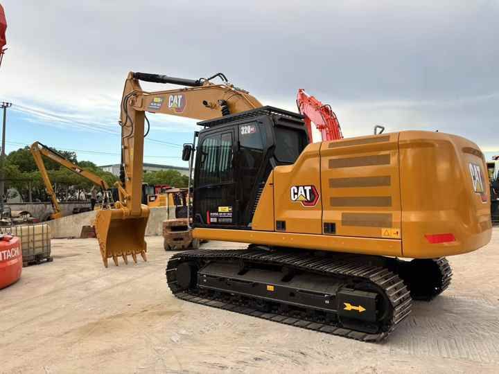 2024 Caterpillar 320GC crawler excavator, rear three-quarter view