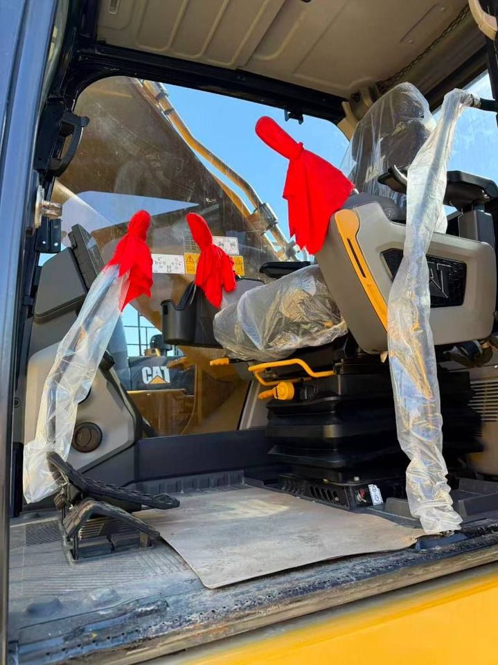 2025 Caterpillar 345 crawler excavator interior view