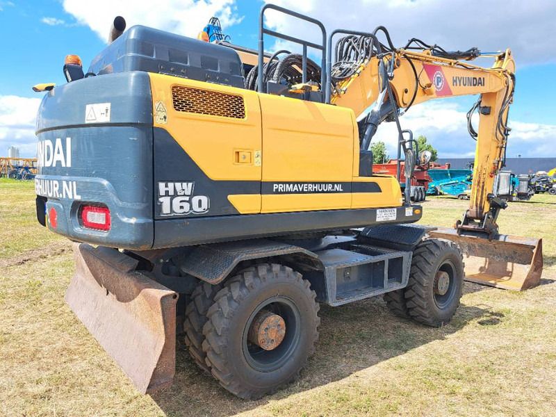 2016 Hyundai HW160 wheel excavator rear three-quarter view