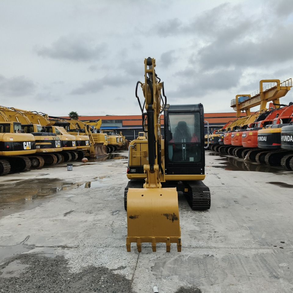 2022 Caterpillar 306E mini excavator, front view 2022 Caterpillar 306E mini excavator, front view