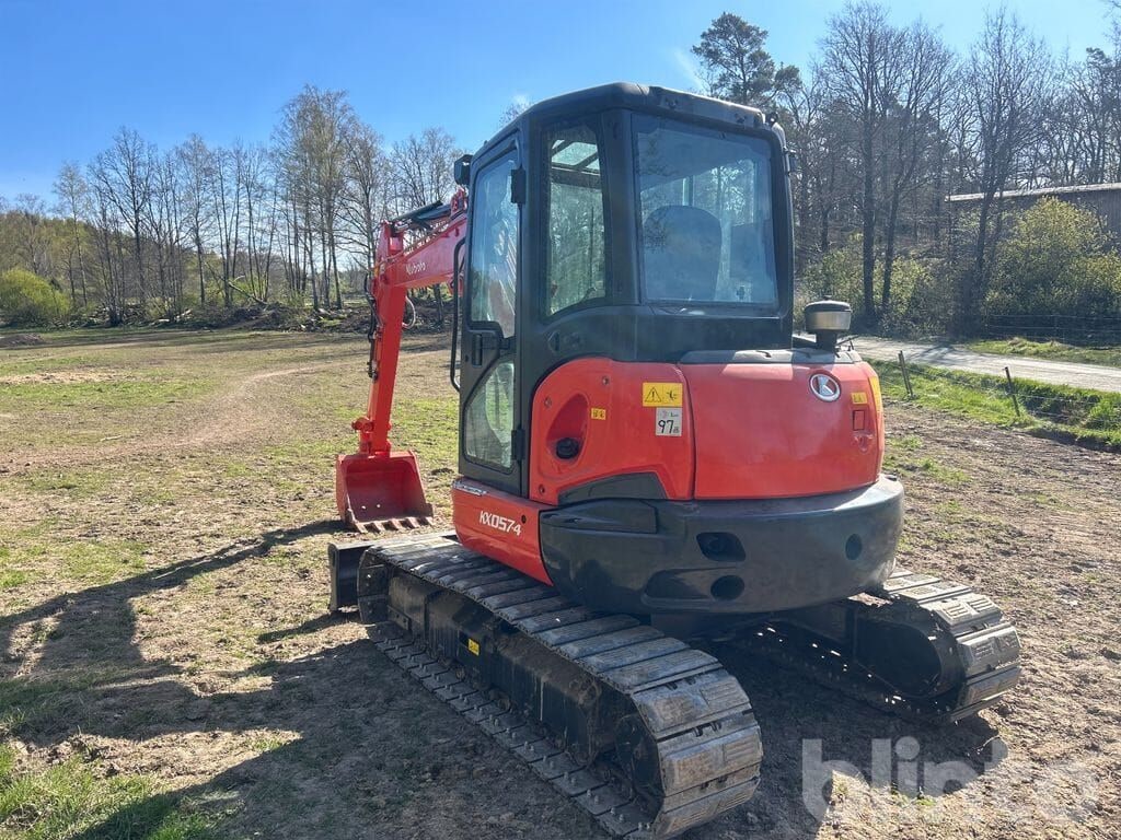 2023 Kubota KX057-4 crawler excavator, rear three-quarter view 2023 Kubota KX057-4 crawler excavator, rear three-quarter view