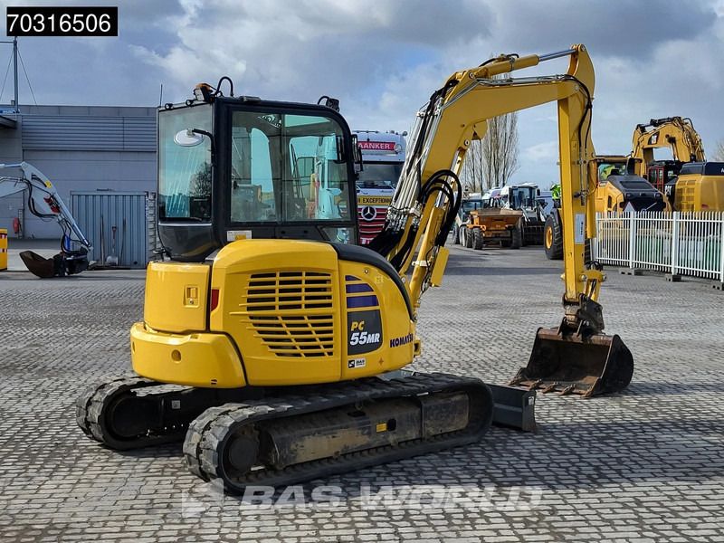 2024 Komatsu PC55MR-5 mini excavator, rear three-quarter view