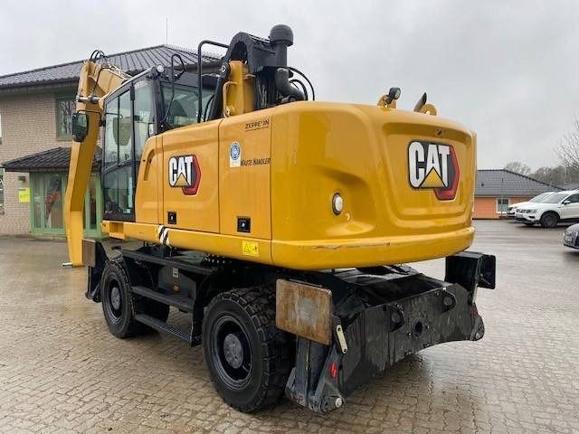 2020 Caterpillar MH3022 material handler rear three-quarter view 2020 Caterpillar MH3022 material handler rear three-quarter view