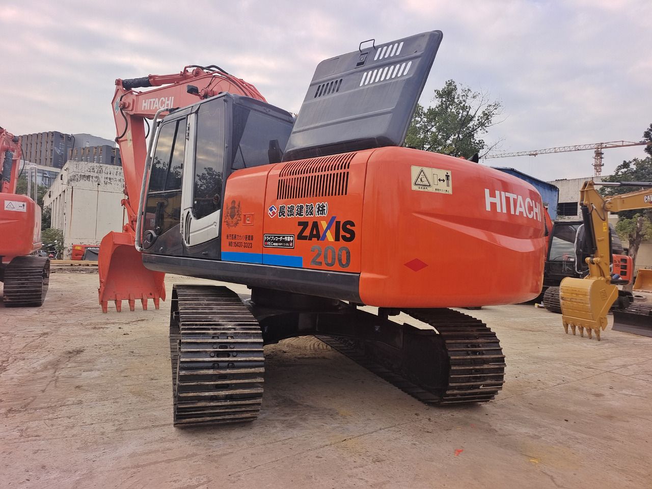 2024 Hitachi Zaxis 200 crawler excavator, rear three-quarter view 2024 Hitachi Zaxis 200 crawler excavator, rear three-quarter view