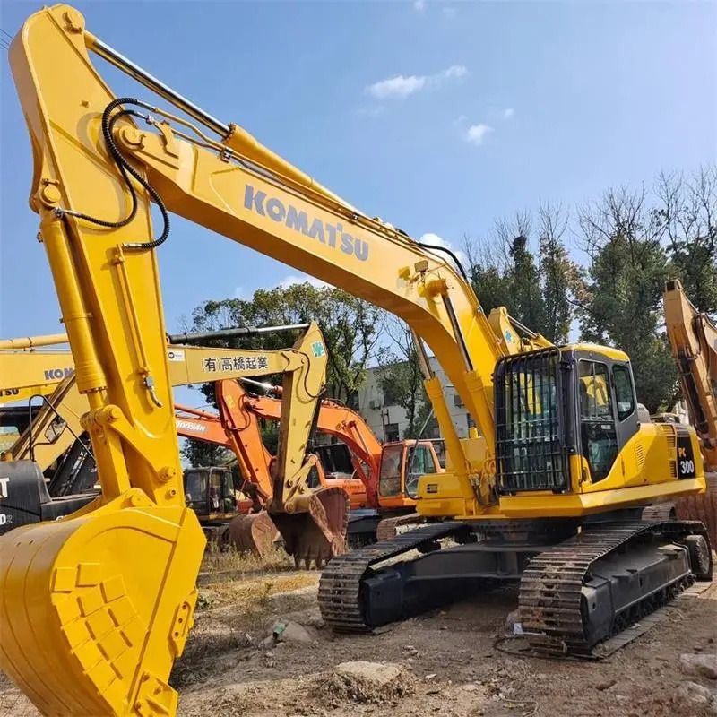 2014 Komatsu PC300 crawler excavator, front three-quarter view