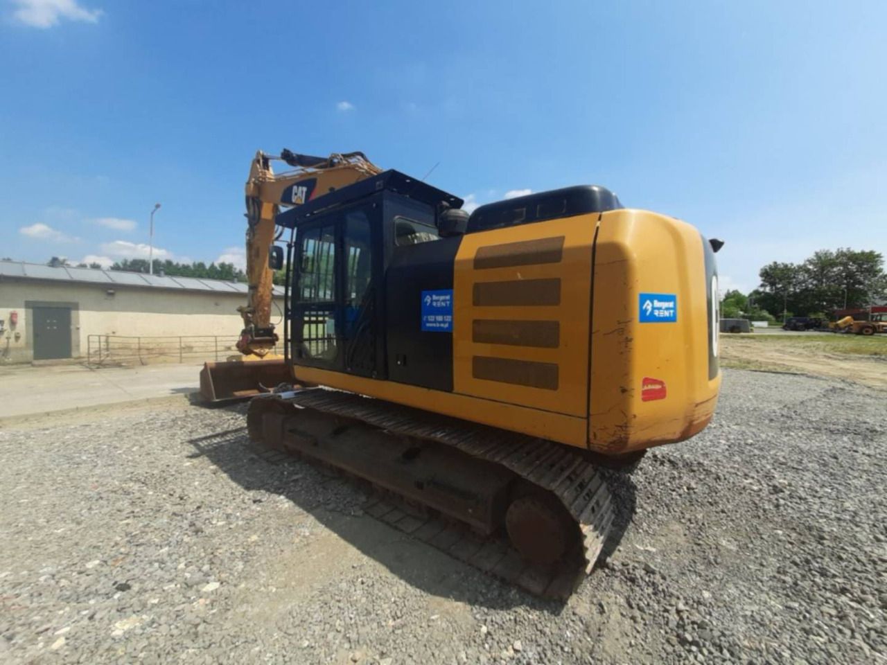 2017 Caterpillar 323FL crawler excavator, rear three-quarter view