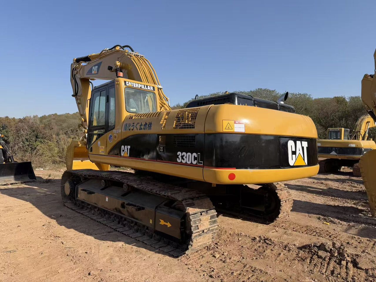 2018 Caterpillar 330CL crawler excavator, rear three-quarter view 2018 Caterpillar 330CL crawler excavator, rear three-quarter view