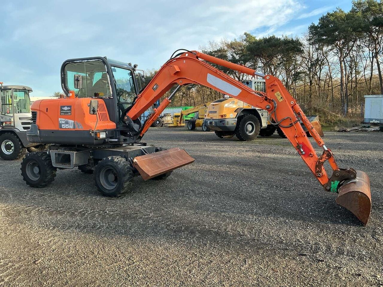 2015 Doosan DX55W mini excavator, side view