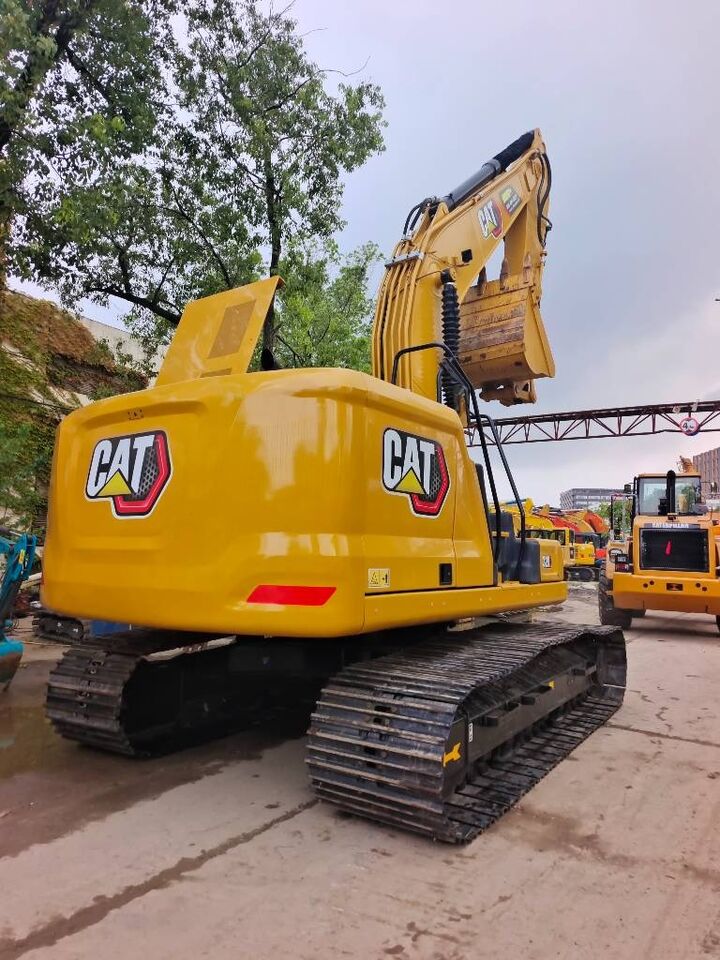 2024 Caterpillar 320GC crawler excavator, rear three-quarter view 2024 Caterpillar 320GC crawler excavator, rear three-quarter view