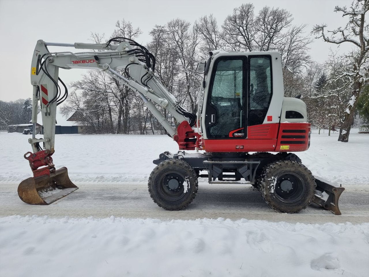 2019 Takeuchi TB295W wheel excavator, side view