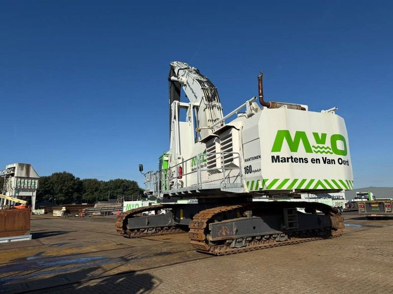 2012 Mantsinen 160 R crawler excavator, rear three-quarter view 2012 Mantsinen 160 R crawler excavator, rear three-quarter view