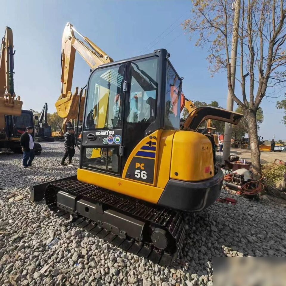 2024 Komatsu PC56 excavator, rear three-quarter view 2024 Komatsu PC56 excavator, rear three-quarter view