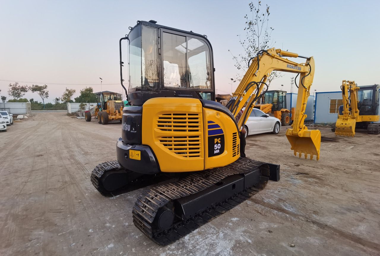 2024 Komatsu PC50MR mini excavator, rear three-quarter view 2024 Komatsu PC50MR mini excavator, rear three-quarter view