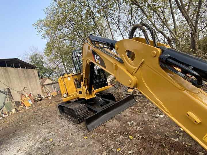 2022 Caterpillar 306E2 mini excavator, side view 2022 Caterpillar 306E2 mini excavator, side view