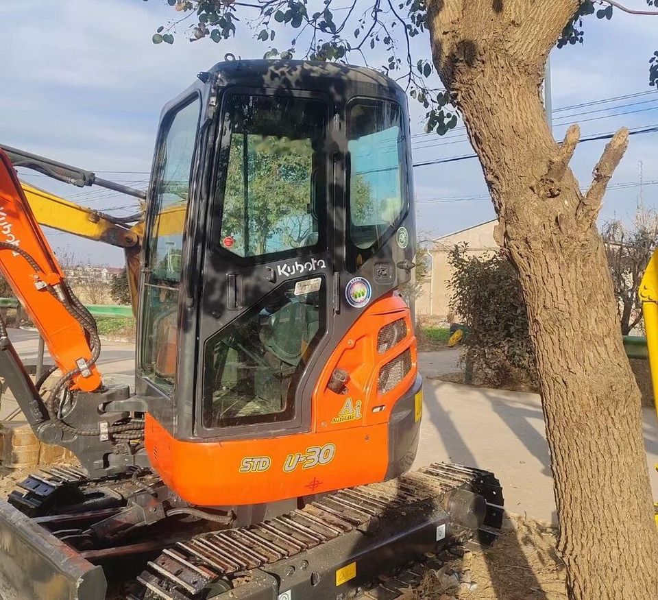 Kubota U-30 mini excavator, side view