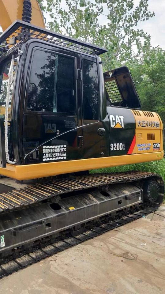 Гусеничный экскаватор 2024 Caterpillar 320D2, вид сбоку Гусеничный экскаватор 2024 Caterpillar 320D2, вид сбоку