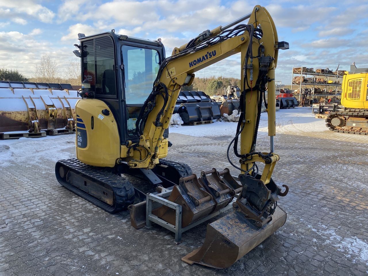 2018 Komatsu PC26MR-3 mini excavator, front three-quarter view 2018 Komatsu PC26MR-3 mini excavator, front three-quarter view