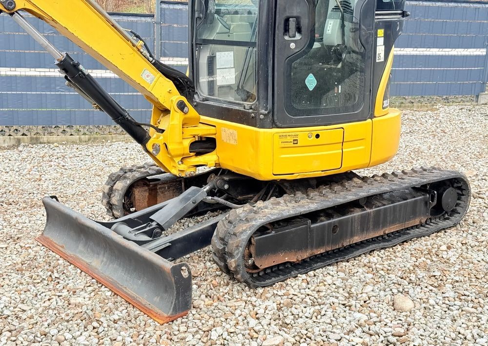 2012 Caterpillar 303.5ECR crawler excavator side view 2012 Caterpillar 303.5ECR crawler excavator side view