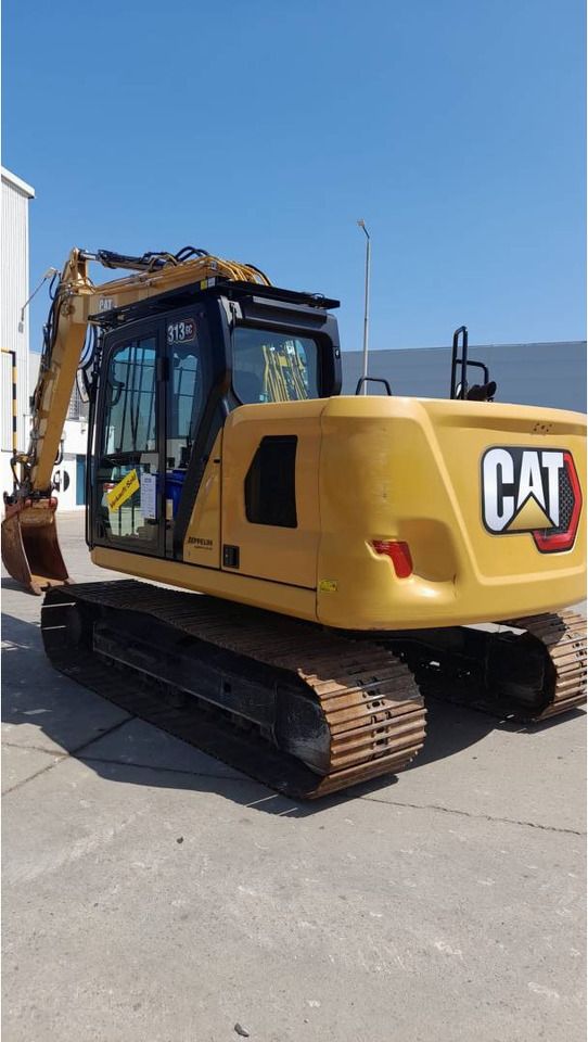 2021 Caterpillar 313-07GC crawler excavator, rear three-quarter view 2021 Caterpillar 313-07GC crawler excavator, rear three-quarter view