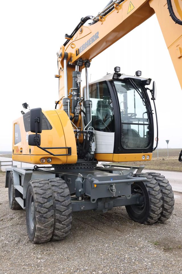 2023 Liebherr A916 Compact Litronic wheel excavator, front three-quarter view 2023 Liebherr A916 Compact Litronic wheel excavator, front three-quarter view