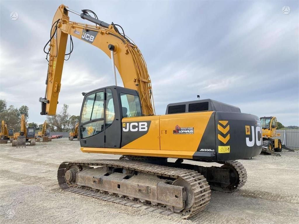 2002 JCB JS 330 LC crawler excavator, rear three-quarter view 2002 JCB JS 330 LC crawler excavator, rear three-quarter view
