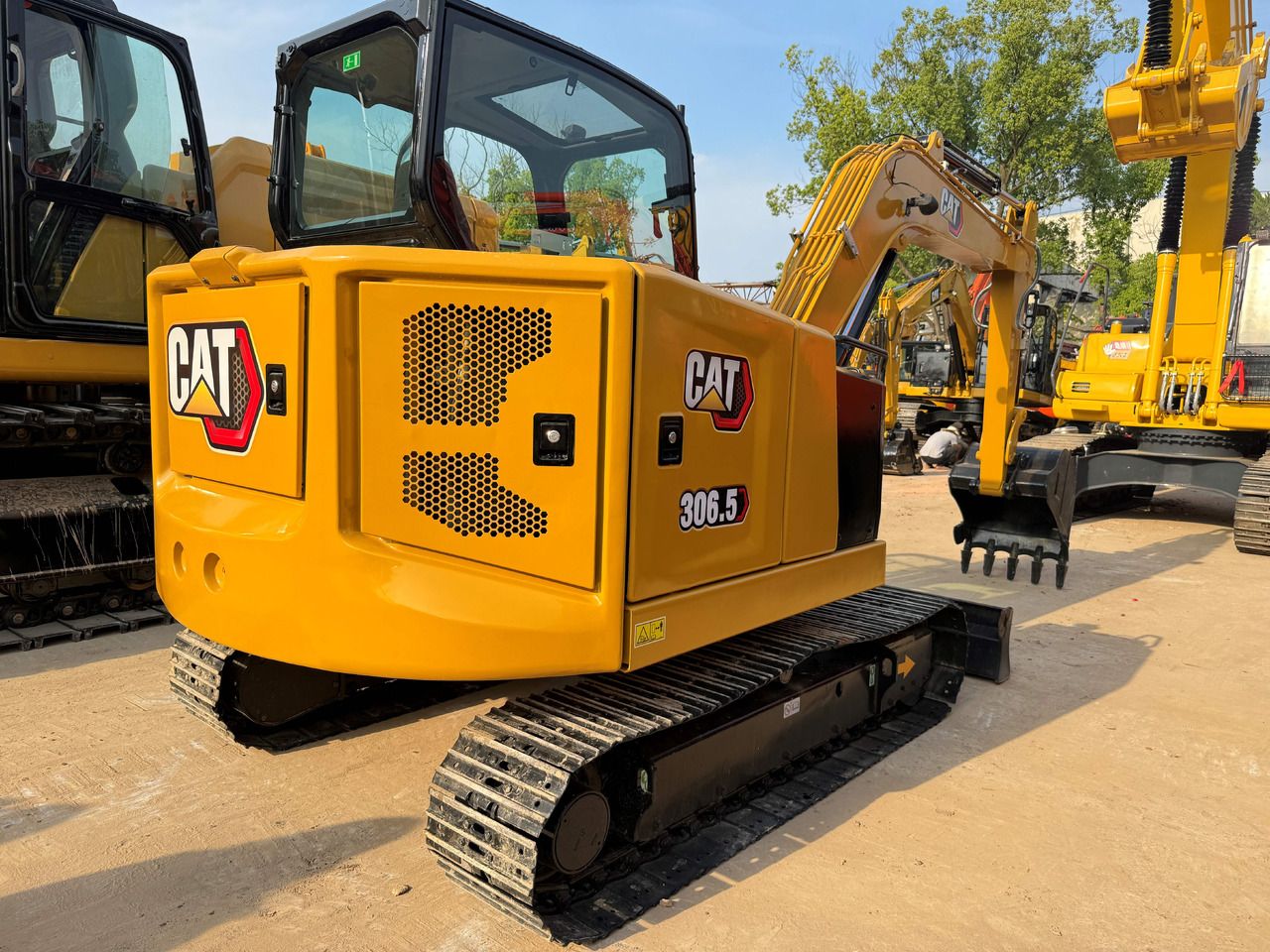 2024 Caterpillar 306.5 crawler excavator rear three-quarter view