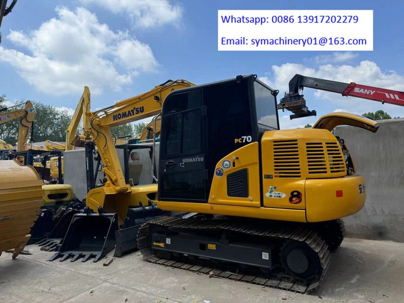 2025 Komatsu PC70 mini excavator, rear three-quarter view 2025 Komatsu PC70 mini excavator, rear three-quarter view