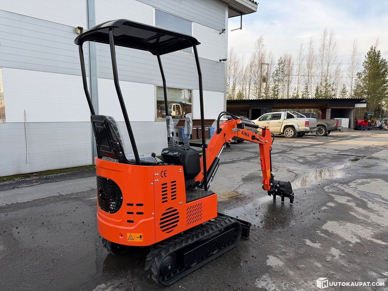 2026 Kima KME10 mini excavator, rear three-quarter view 2026 Kima KME10 mini excavator, rear three-quarter view