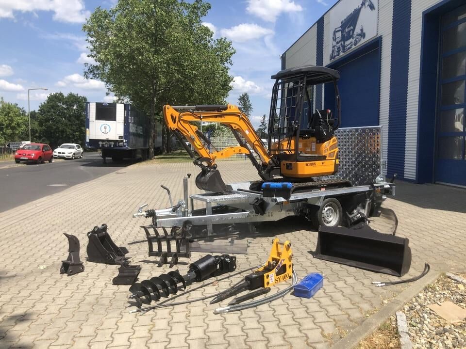 Berger Kraus BK1700JS mini excavator on trailer with attachments Berger Kraus BK1700JS mini excavator on trailer with attachments