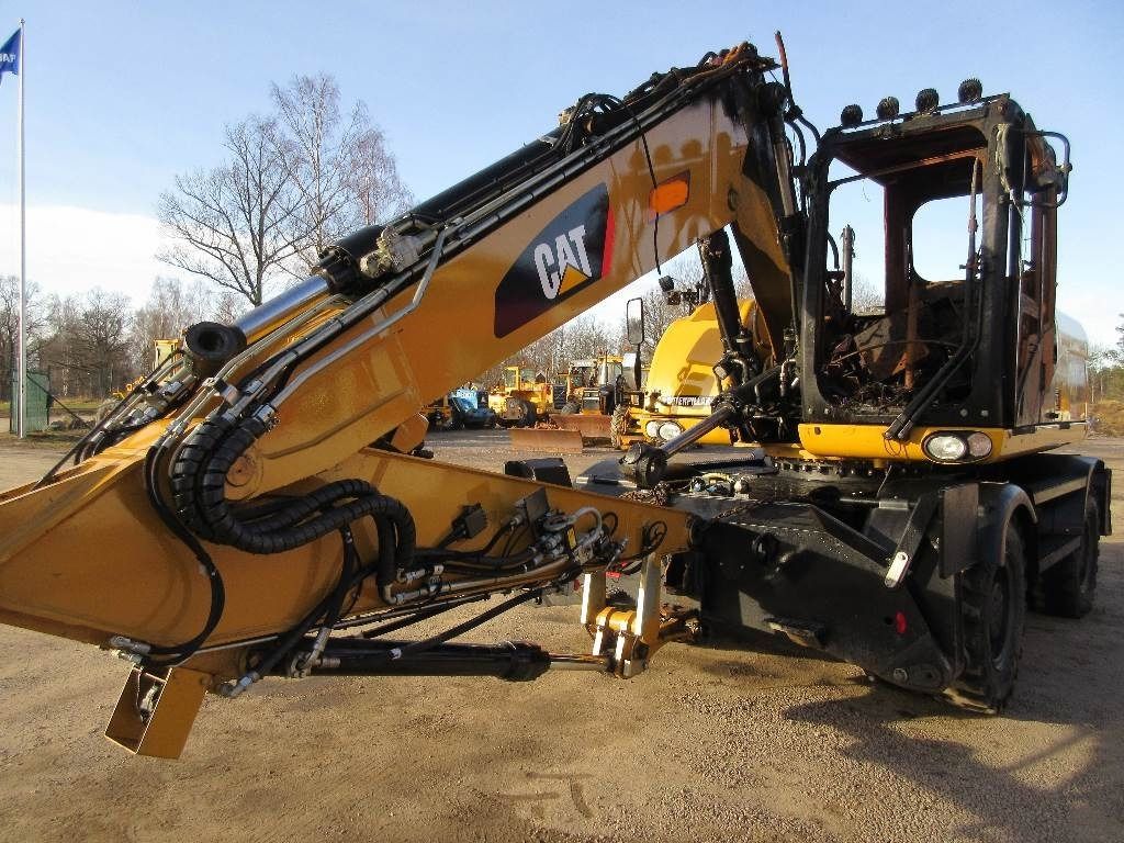 Caterpillar M316D wheel excavator, side view