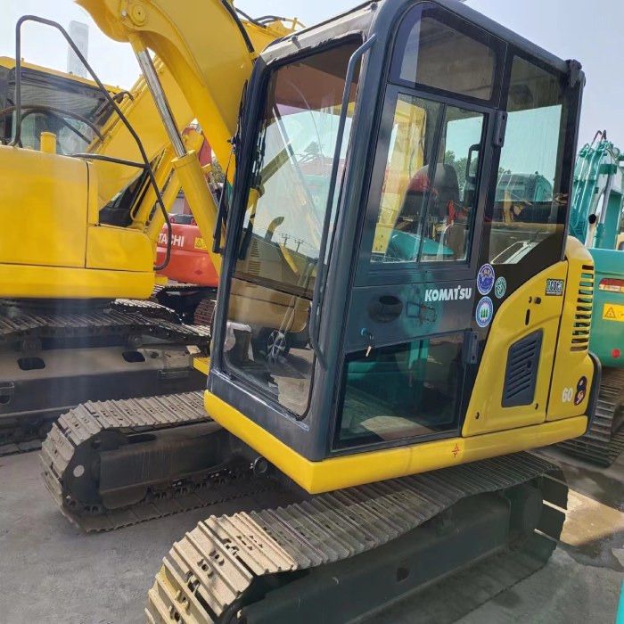 2022 Komatsu PC60-8 mini excavator, side view of the cab 2022 Komatsu PC60-8 mini excavator, side view of the cab