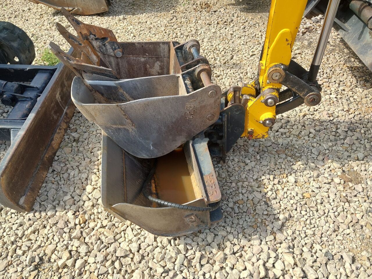 2022 JCB 19C Mini Excavator bucket attachment detail
