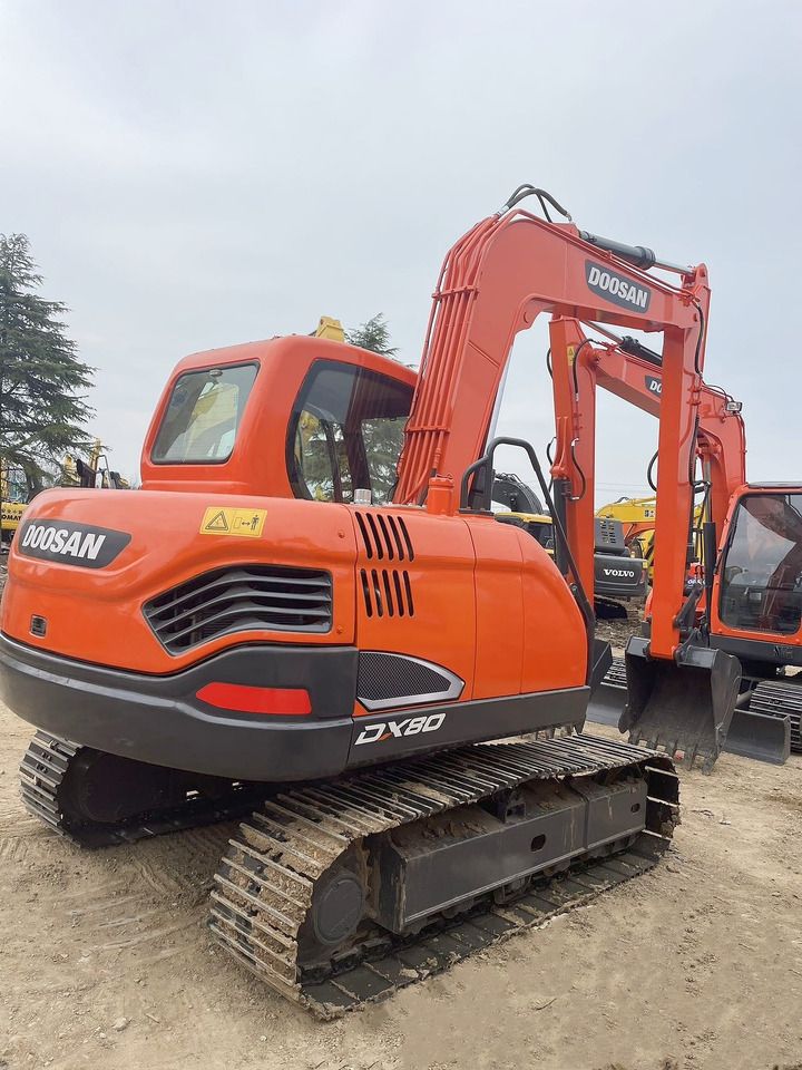 2021 Doosan DX80 crawler excavator, rear three-quarter view 2021 Doosan DX80 crawler excavator, rear three-quarter view