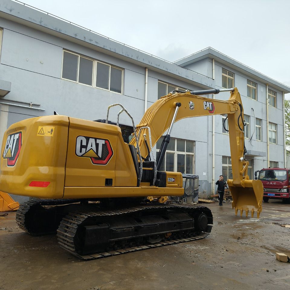 Caterpillar 320GC crawler excavator, rear three-quarter view