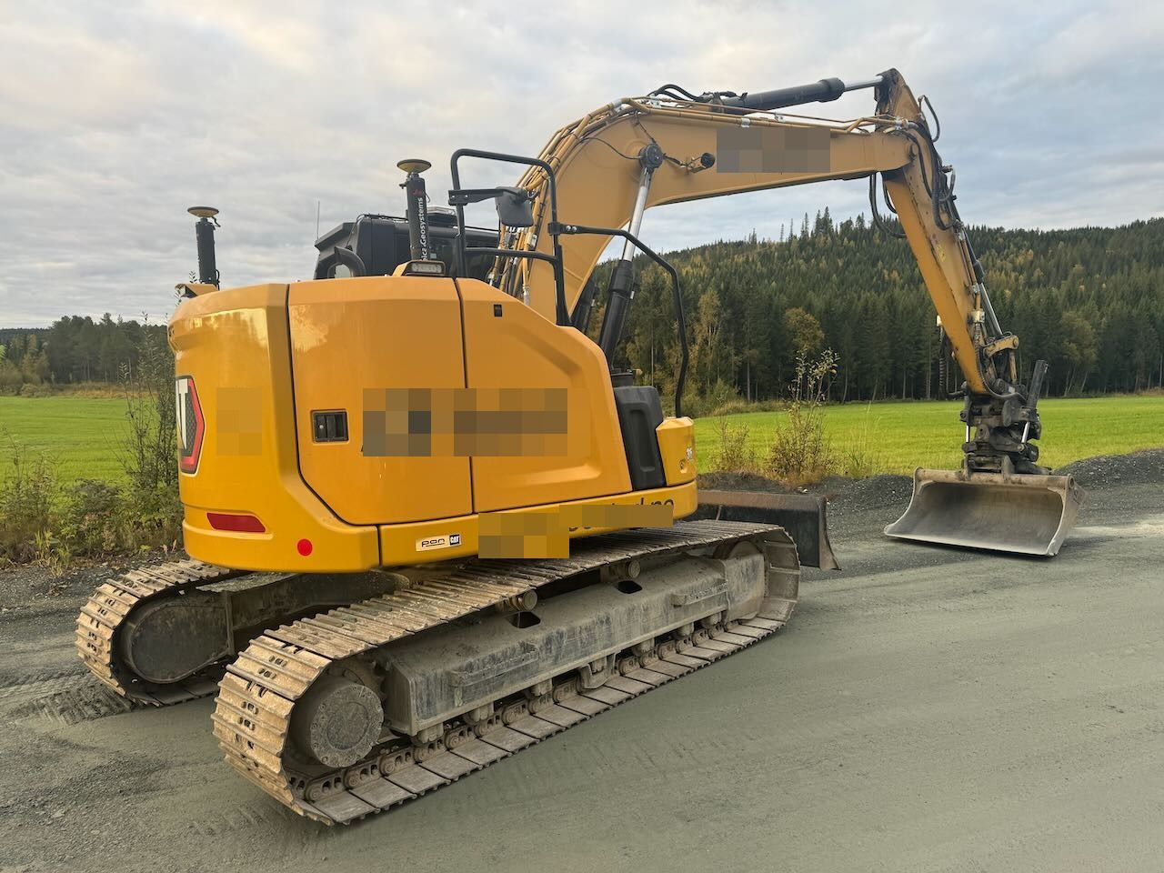2022 Caterpillar 315 crawler excavator, rear three-quarter view