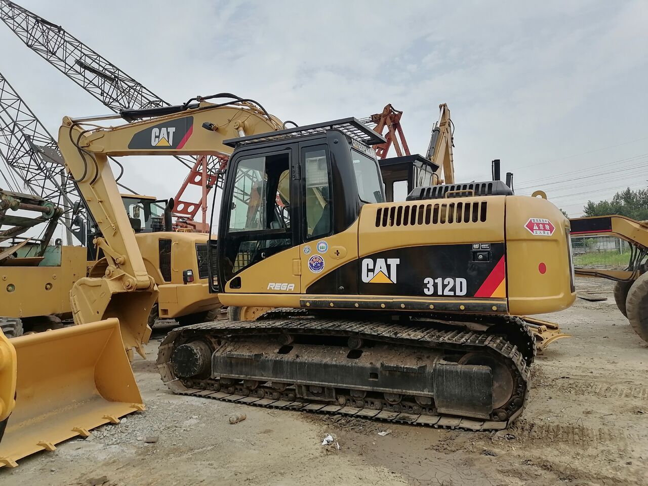 2022 Caterpillar 312D excavator, side profile view