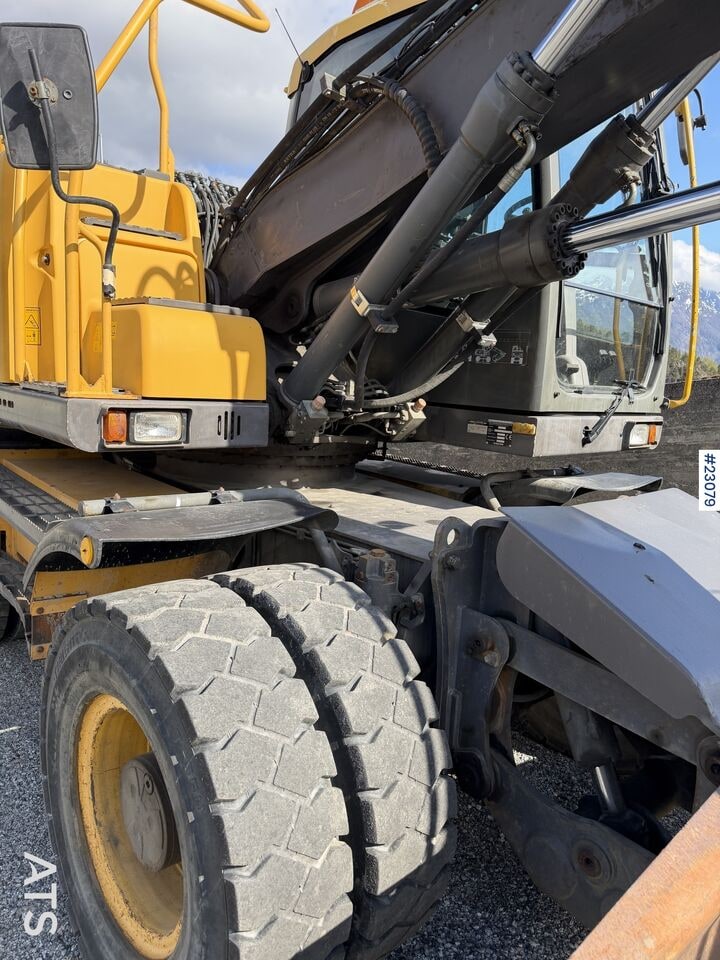 2009 Volvo EW140C wheel excavator side view