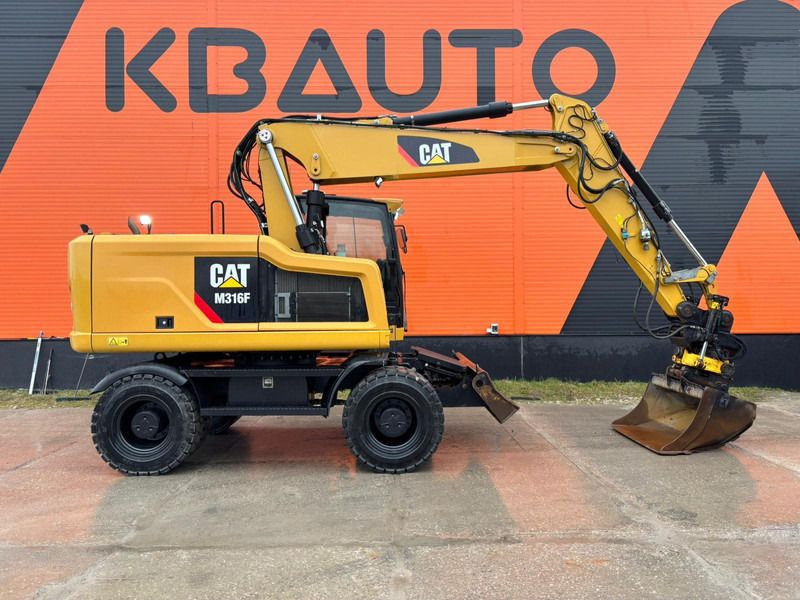 2016 Caterpillar M316F wheel excavator side view 2016 Caterpillar M316F wheel excavator side view