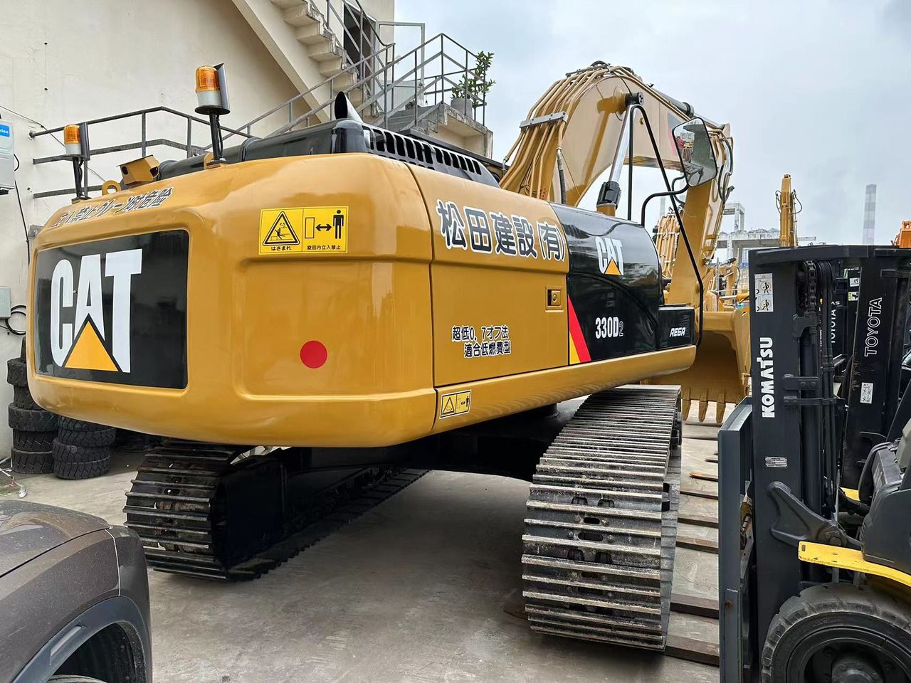 2023 Caterpillar 330D2 crawler excavator, rear three-quarter view 2023 Caterpillar 330D2 crawler excavator, rear three-quarter view