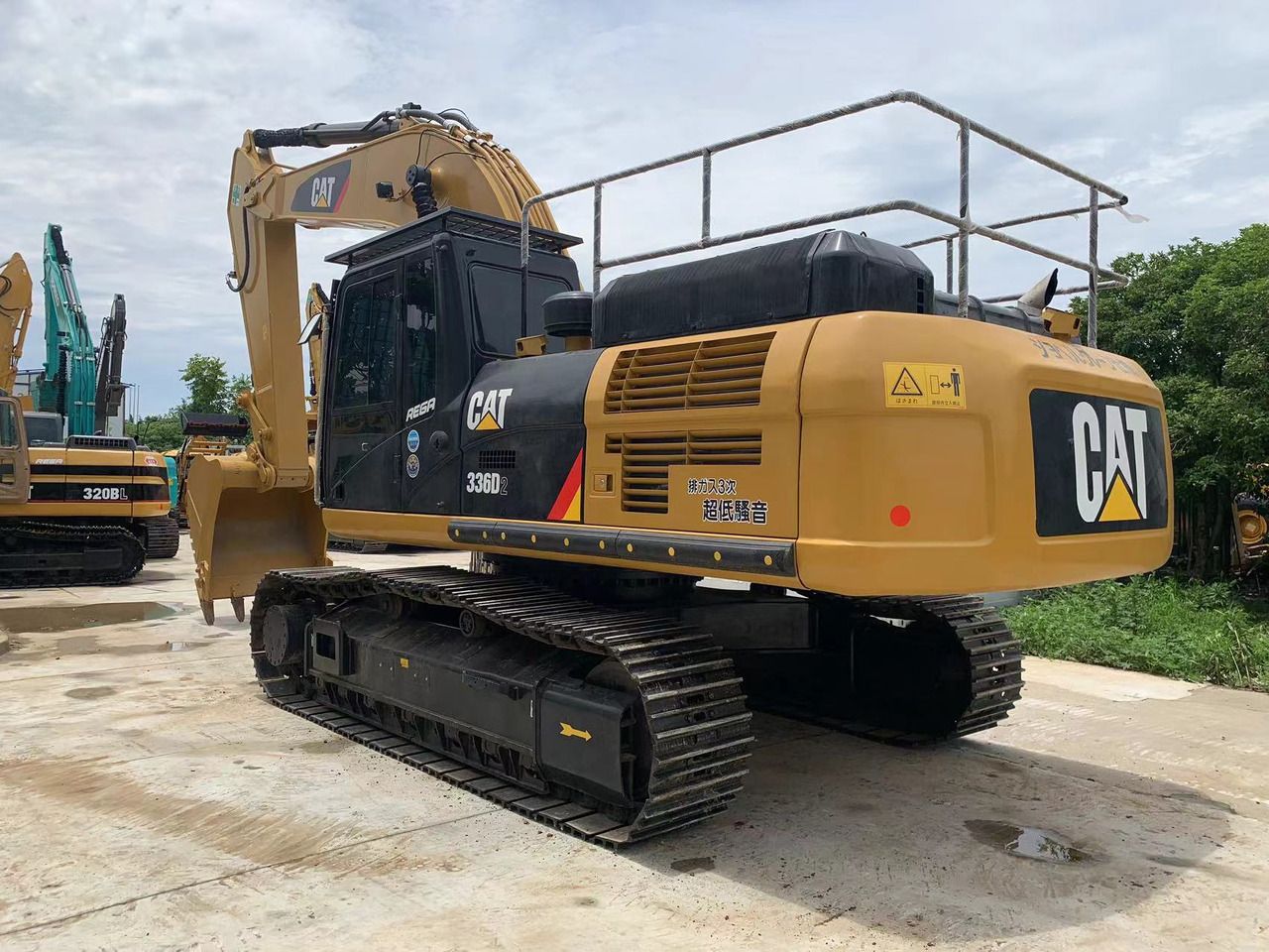 2023 Caterpillar 336D2 crawler excavator, rear three-quarter view