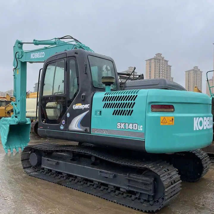 2011 Kobelco SK140LC crawler excavator, rear three-quarter view 2011 Kobelco SK140LC crawler excavator, rear three-quarter view