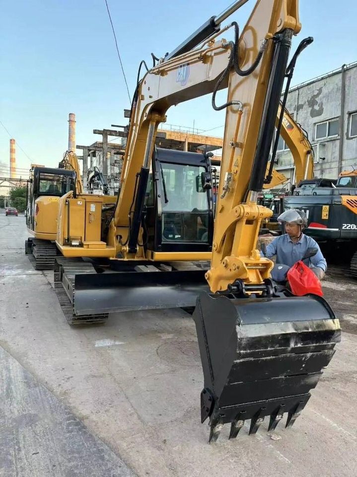 2023 Caterpillar 307 mini excavator, front three-quarter view 2023 Caterpillar 307 mini excavator, front three-quarter view