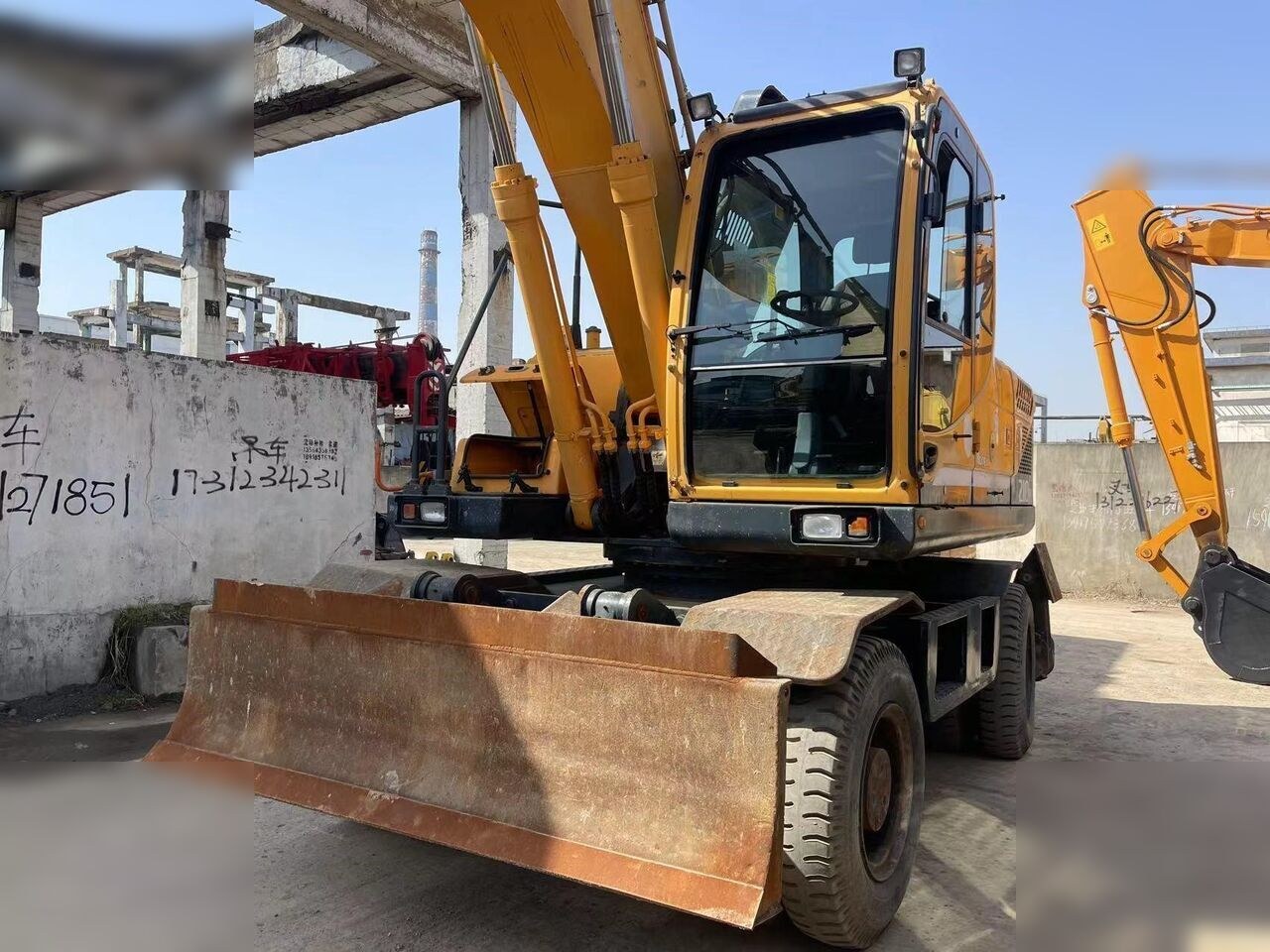 2024 Hyundai R210W-9 wheel excavator front three-quarter view 2024 Hyundai R210W-9 wheel excavator front three-quarter view