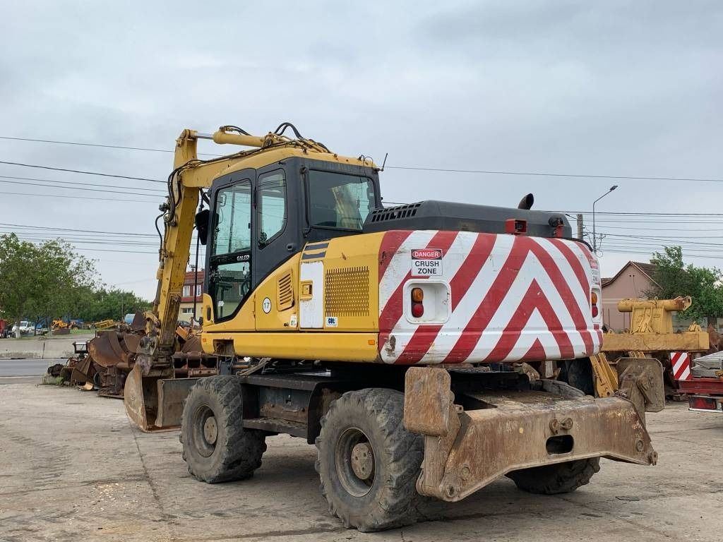 2007 Komatsu PW140-7 wheel excavator, rear three-quarter view