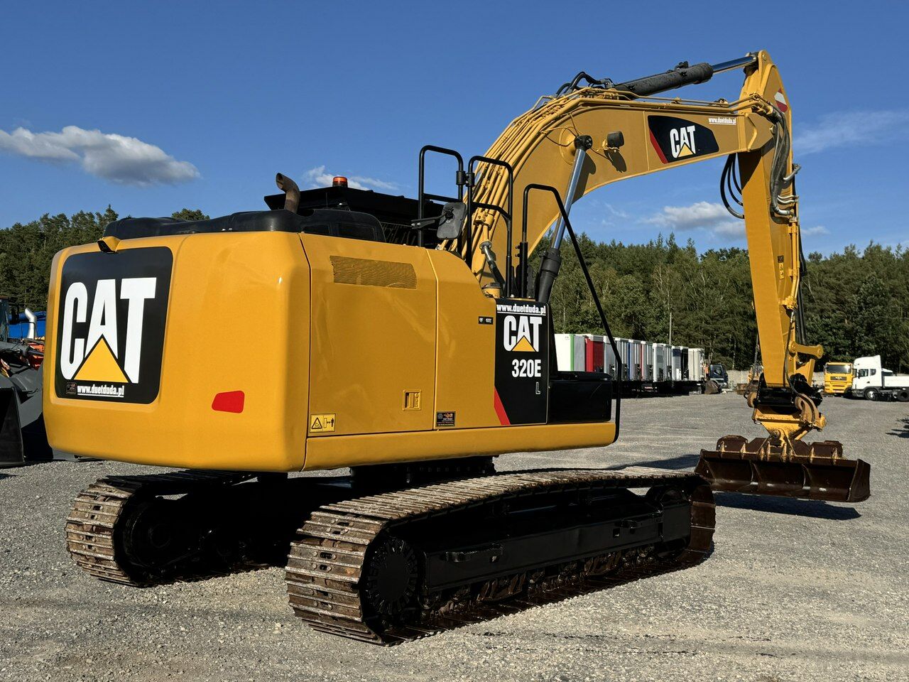 2015 Caterpillar 320EL crawler excavator, rear three-quarter view