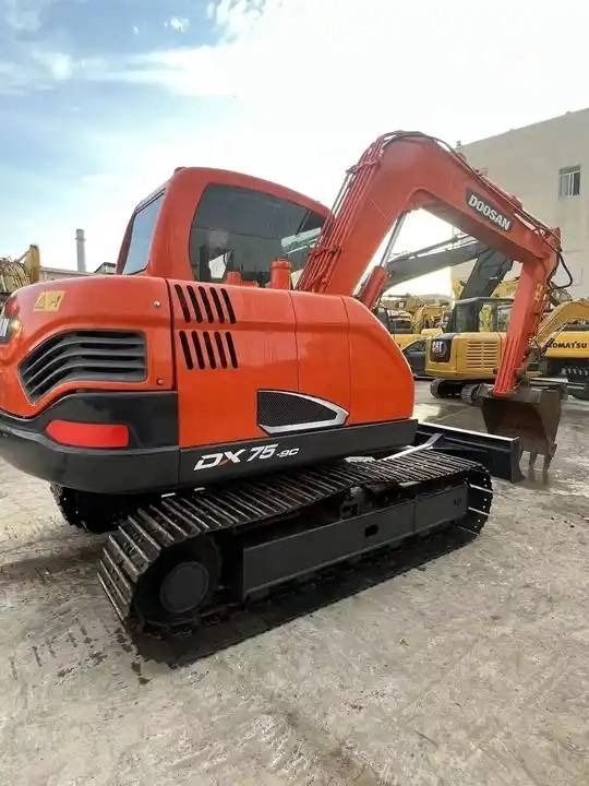 2023 Doosan DX75-9C mini excavator, rear three-quarter view 2023 Doosan DX75-9C mini excavator, rear three-quarter view