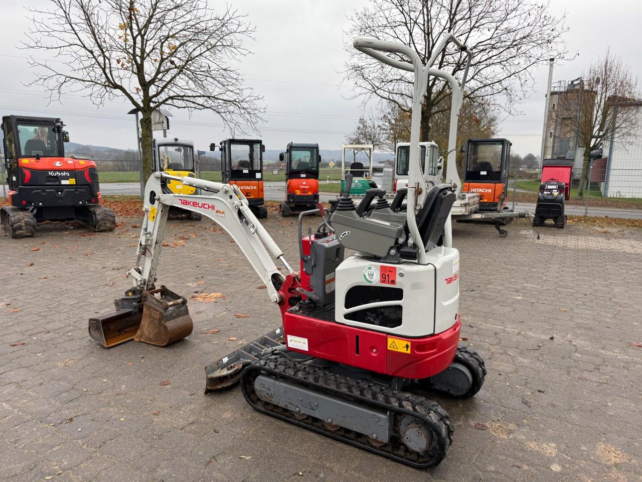 2022 Takeuchi TB210R mini excavator, rear three-quarter view 2022 Takeuchi TB210R mini excavator, rear three-quarter view