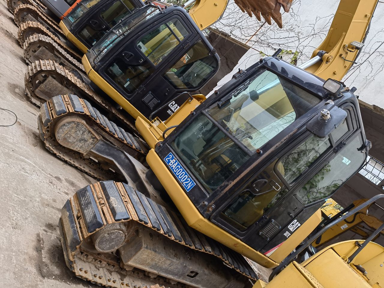 2024 Caterpillar 307E excavator, high-angle side view